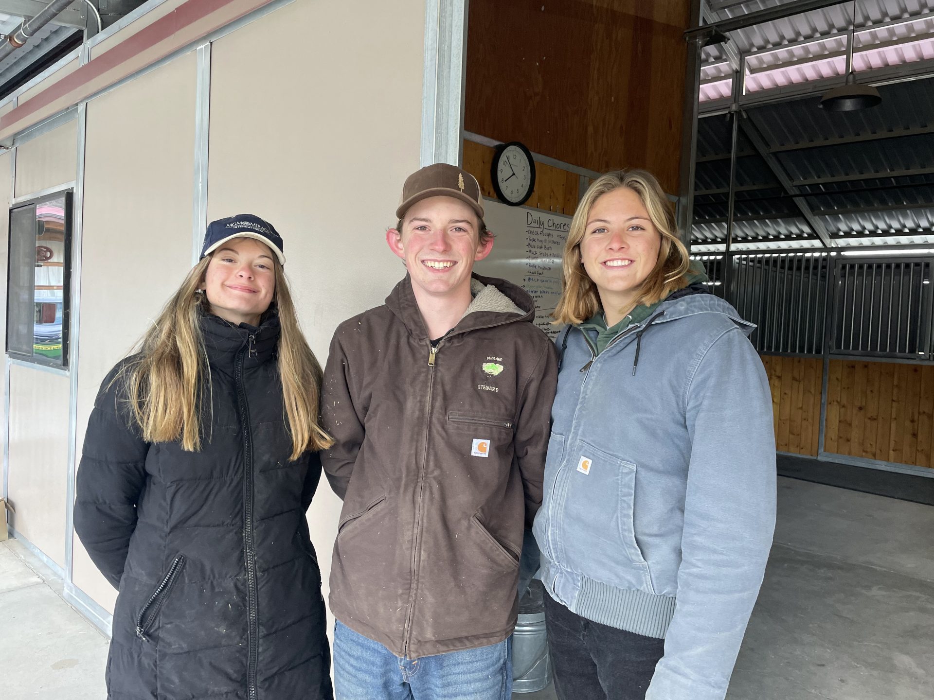 Three students at the Midland barn